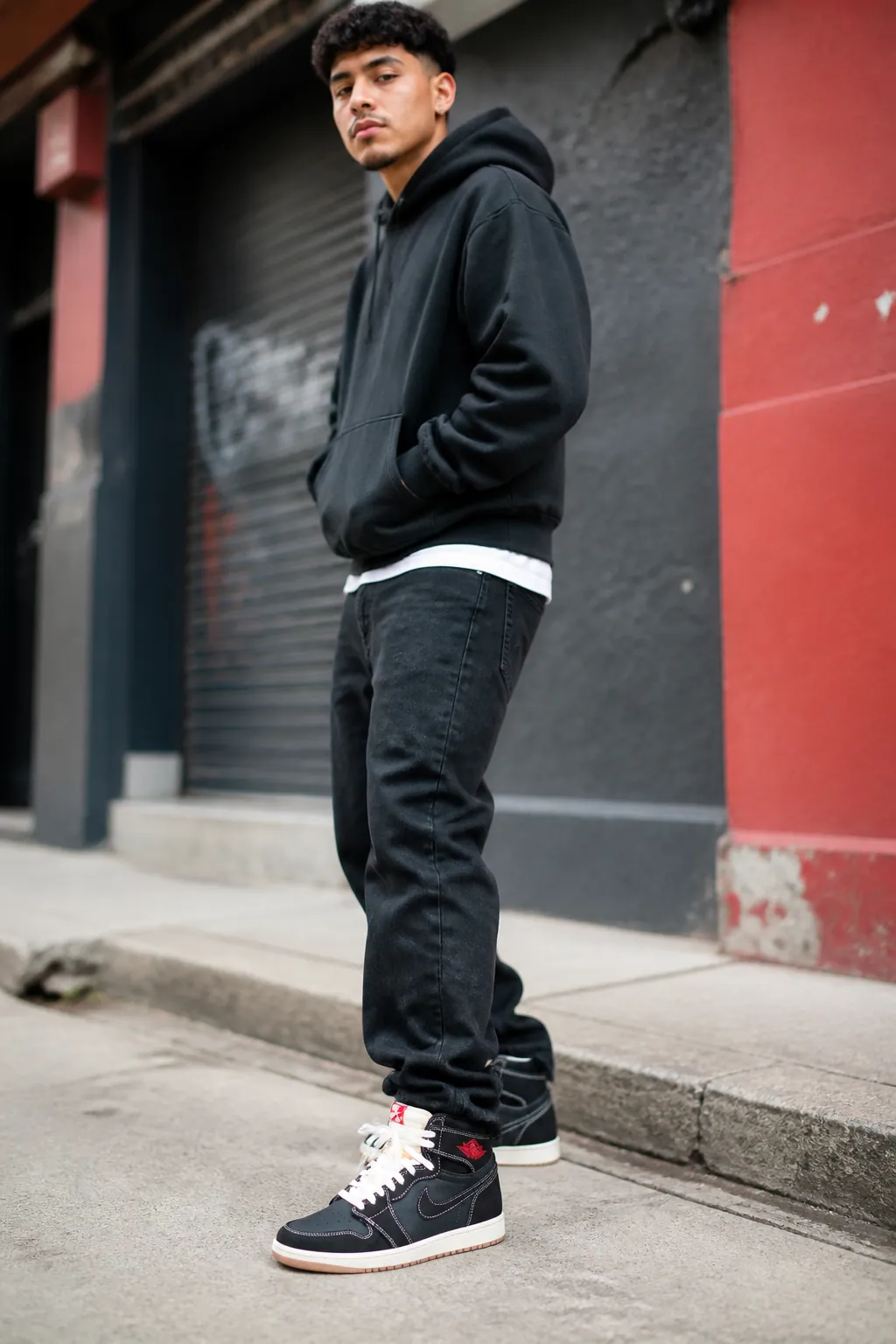 Confident sneakerhead wearing Air Jordan 1 Flight Club in urban setting looking like they belong to something exclusive