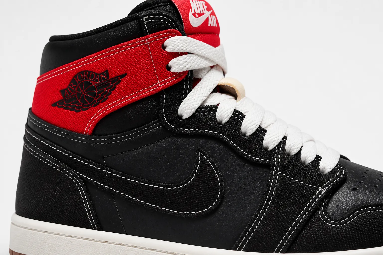 Detailed view of the striking University Red accent panels on the classic Jordan silhouette