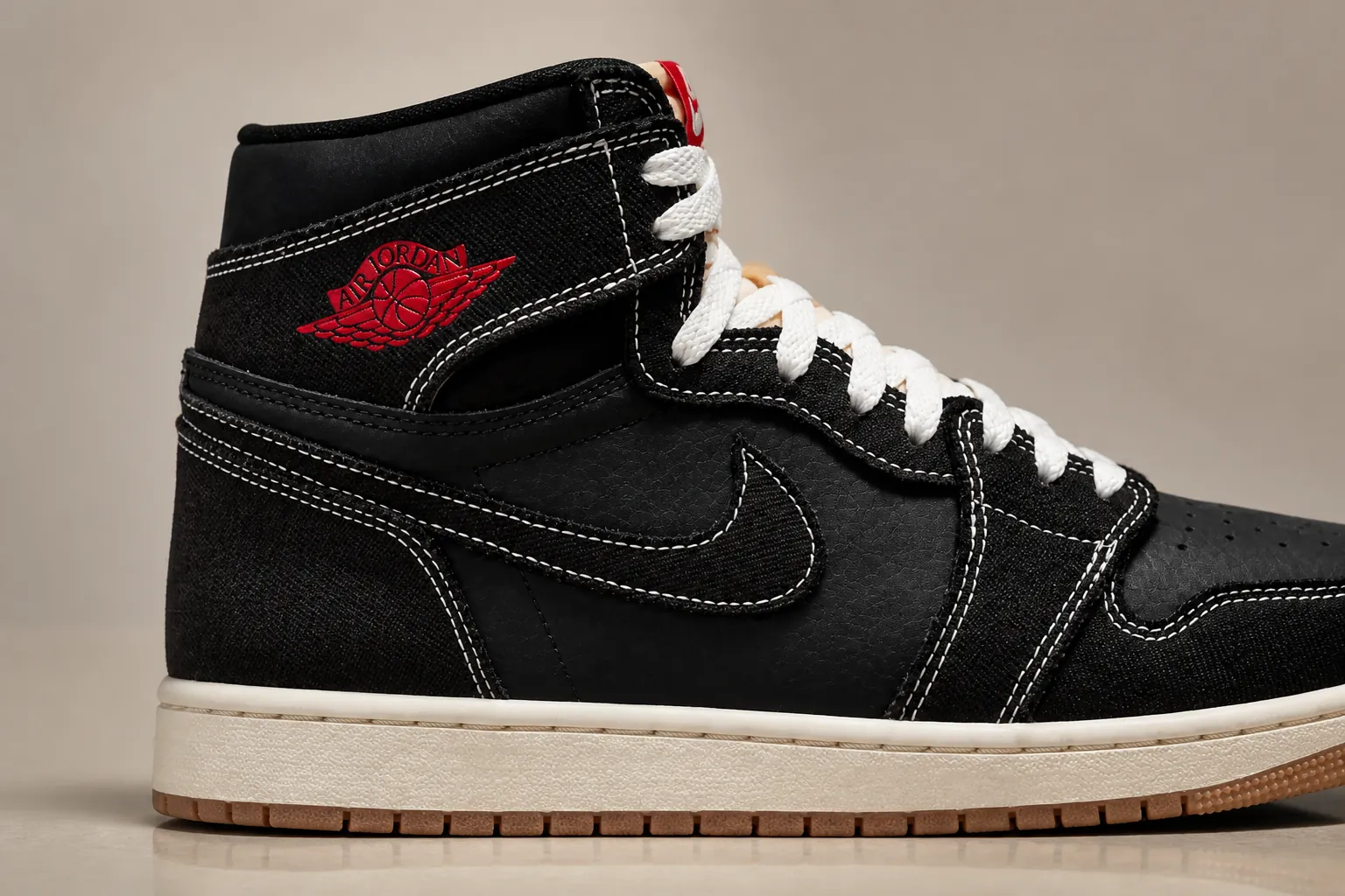 Classic Jumpman logo embroidered on the heel in crisp white against the black textile background