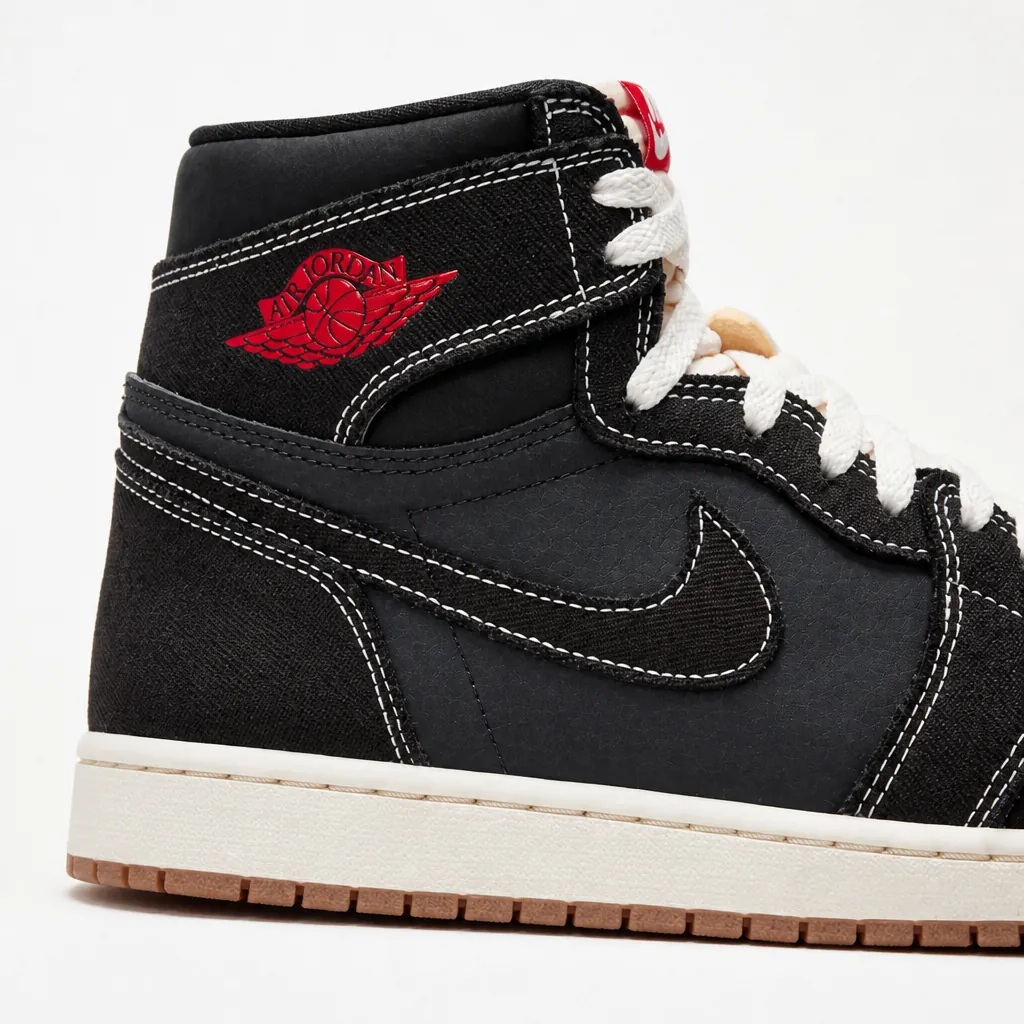 Air Jordan 1 Flight Club size 7 displayed with black woven textile and red accents