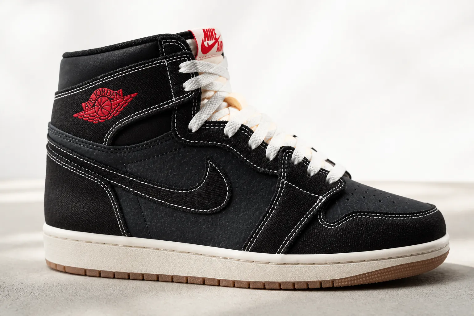 University Red accent details on the Air Jordan 1 Flight Club swoosh and heel tab highlighting classic colorway