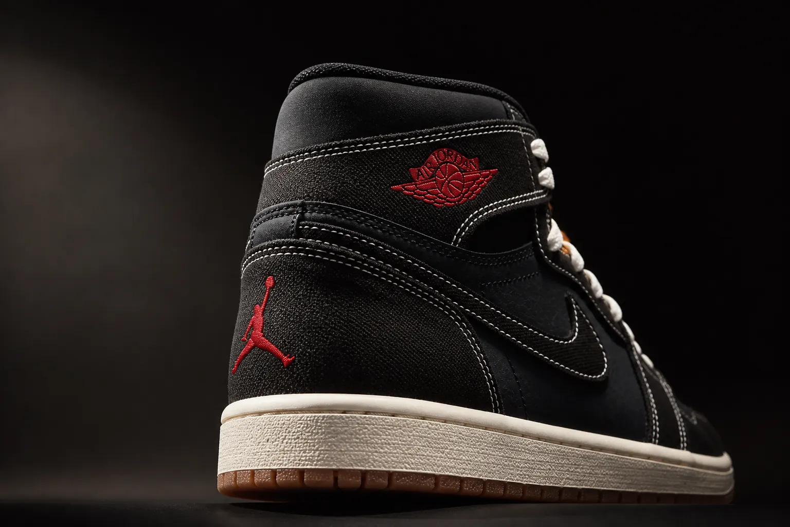 Stunning final hero angle of the complete Air Jordan 1 Flight Club sneaker showcasing the iconic Jumpman logo embroidery on the heel with dramatic lighting