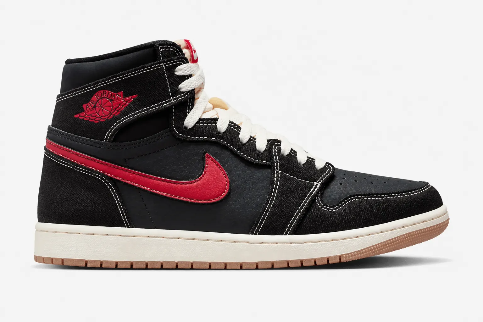 Side profile detailed shot of the Air Jordan 1 showing the vibrant University Red swoosh and crisp white Jumpman logo