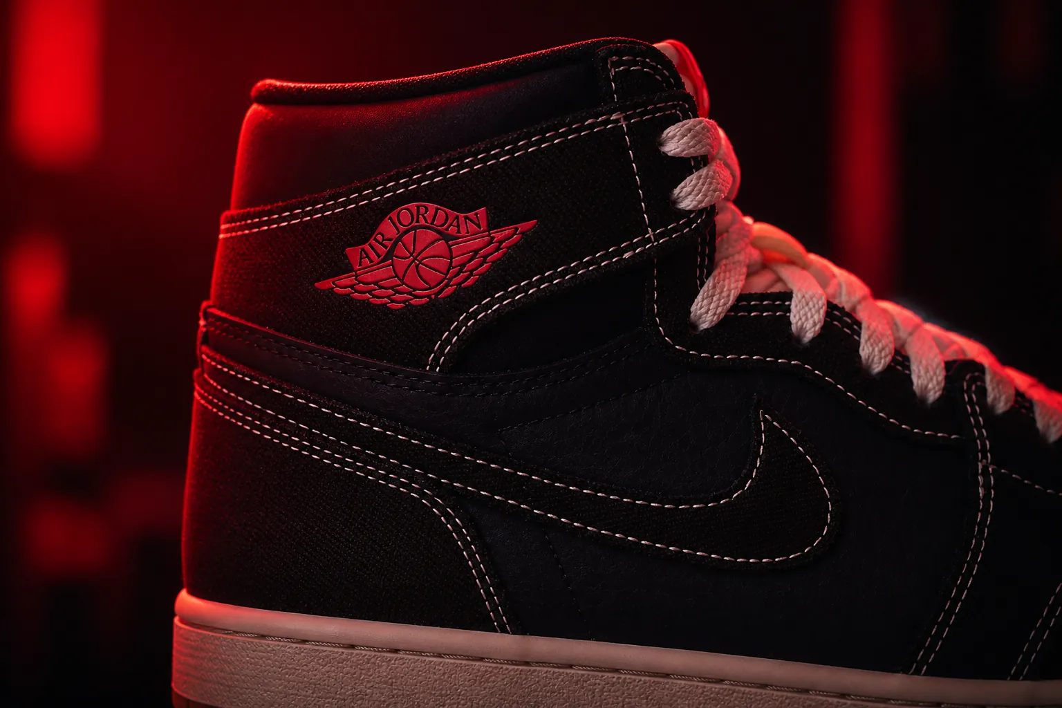 The iconic Jumpman logo glowing prominently on the Air Jordan 1 Flight Club with dramatic red lighting and premium finish